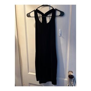 Sleeveless tight black velvet dress